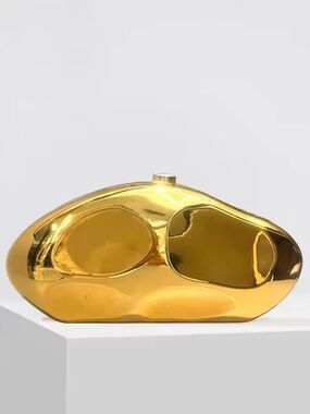 Gold Metallic Sculptural Clutch Shimmering glossy gold purse with chain strap
